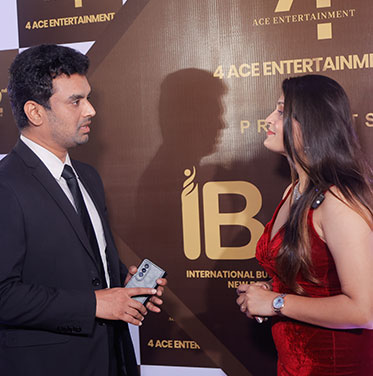 Kalyan Raj Bandaru giving a media interview at the International Business Awards 2023 media wall in New Delhi